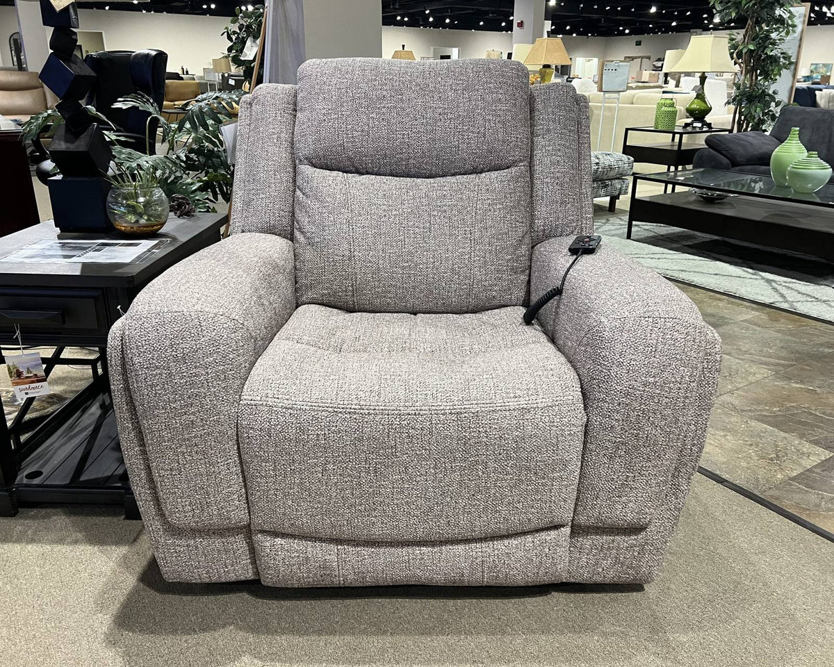 Gray fabric power recliner at The Sofa Store showroom in Towson