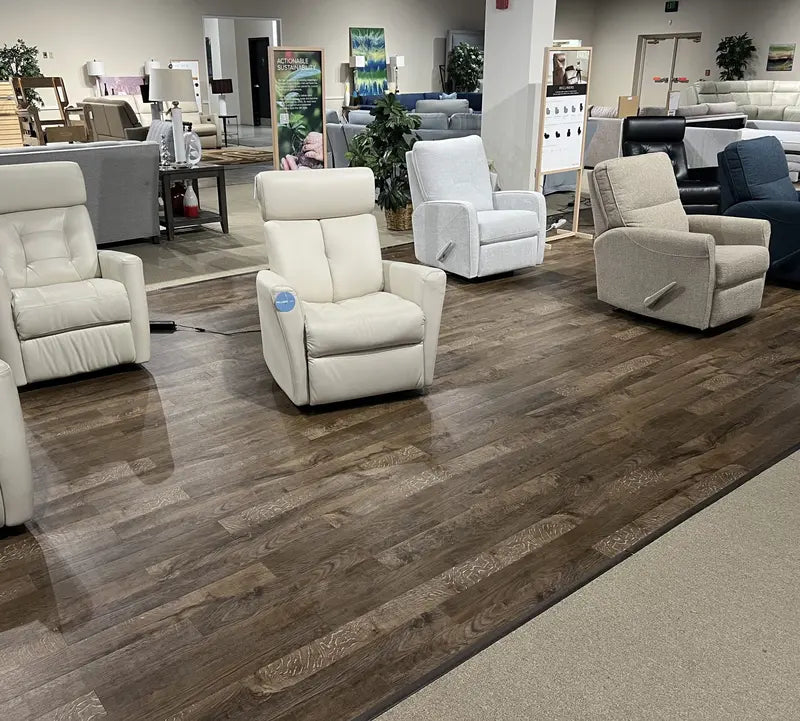 Recliners on the floor at The Sofa Store showroom in Towson