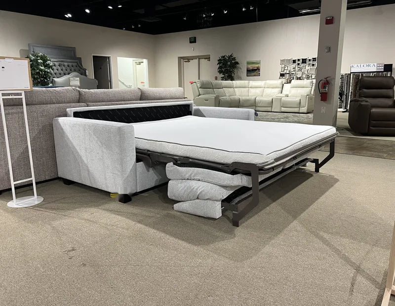 Sleepers on the floor at The Sofa Store showroom in Towson